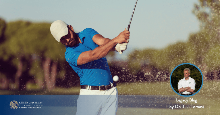 Golfer hitting a fried egg bunker shot as sand sprays through impact.