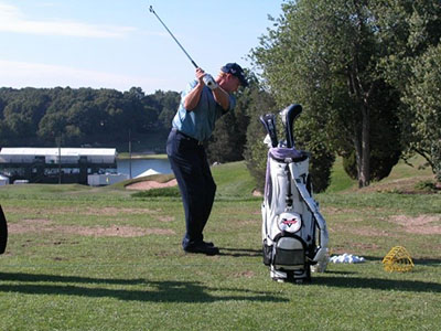 Golfer demonstrating swing - Keiser Golf