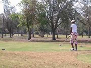 golfer preparing for golf shot
