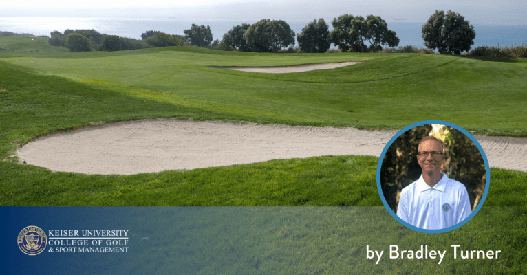 Golf course with sand bunkers and ocean view, featuring Bradley Turner from Keiser University College of Golf.