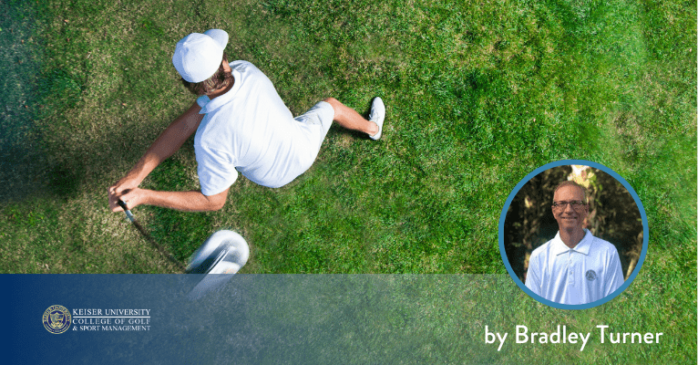 Aerial view of golfer mid-swing on grass, featuring Bradley Turner from Keiser University College of Golf.