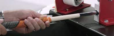 Image showing how to install the new grip. 