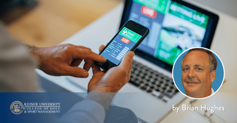 User checking live sports betting on phone, featuring Brian Hughes from Keiser University College of Golf.