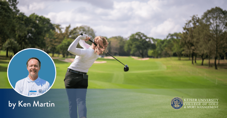 Female golfer taking a fairway shot near bunkers, featuring Ken Martin from Keiser University College of Golf.