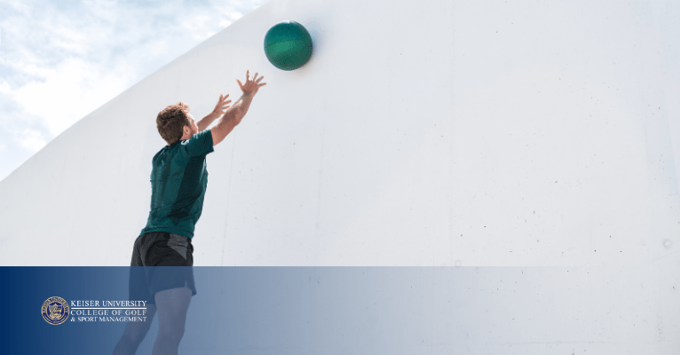 Golfer throws medicine ball at wall to boost core strength and power for a more effective golf swing.